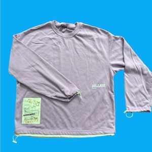 Purple long sleeve with small graphic and "villain" print with sleeve details